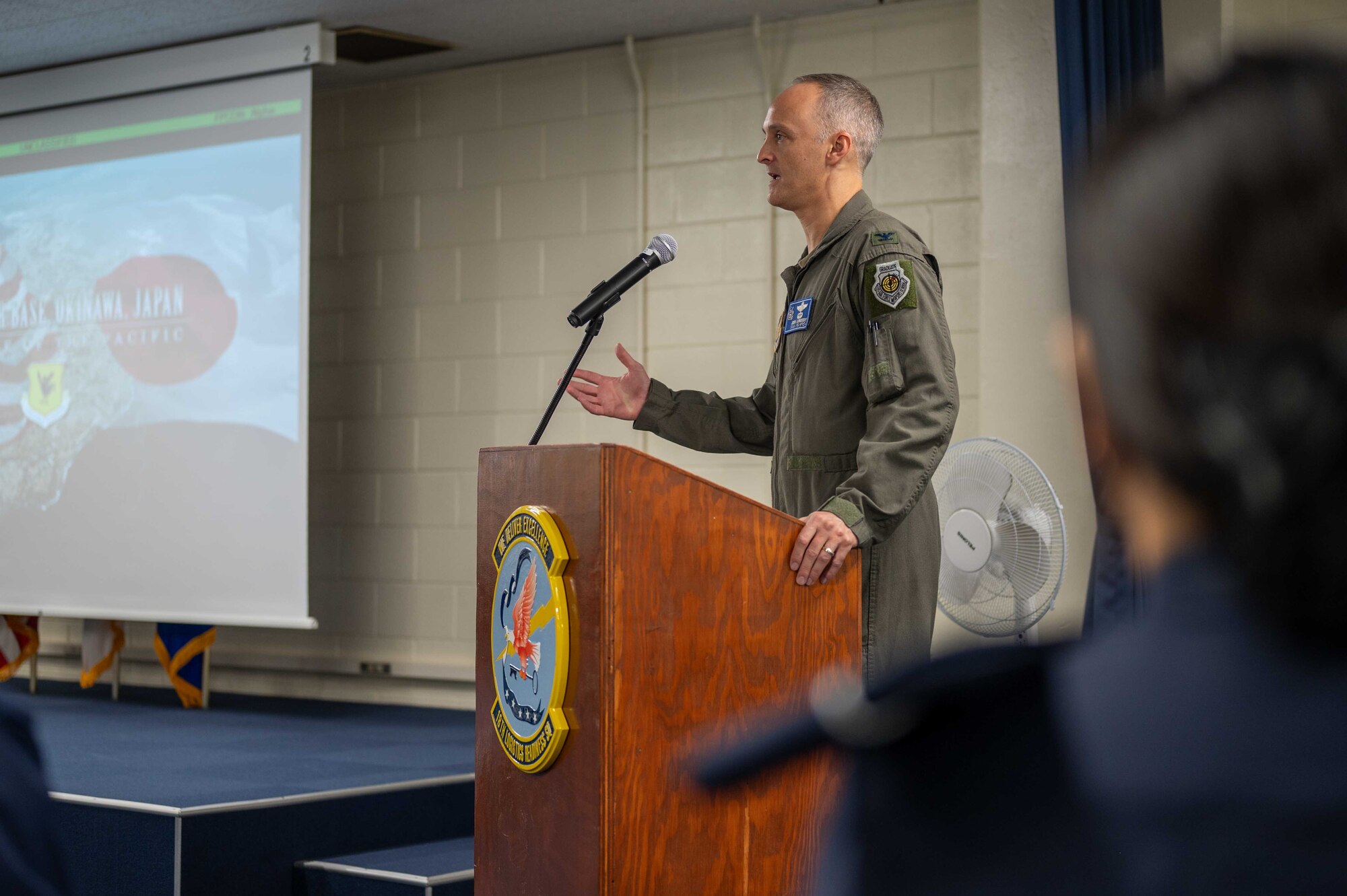 U.S. Air Force Col. Joshua Lundeby, 18th Wing deputy commander, gives a mission briefing to Republic of Korea Air Force Academy students at Kadena Air Base, Japan, Nov. 21, 2024.