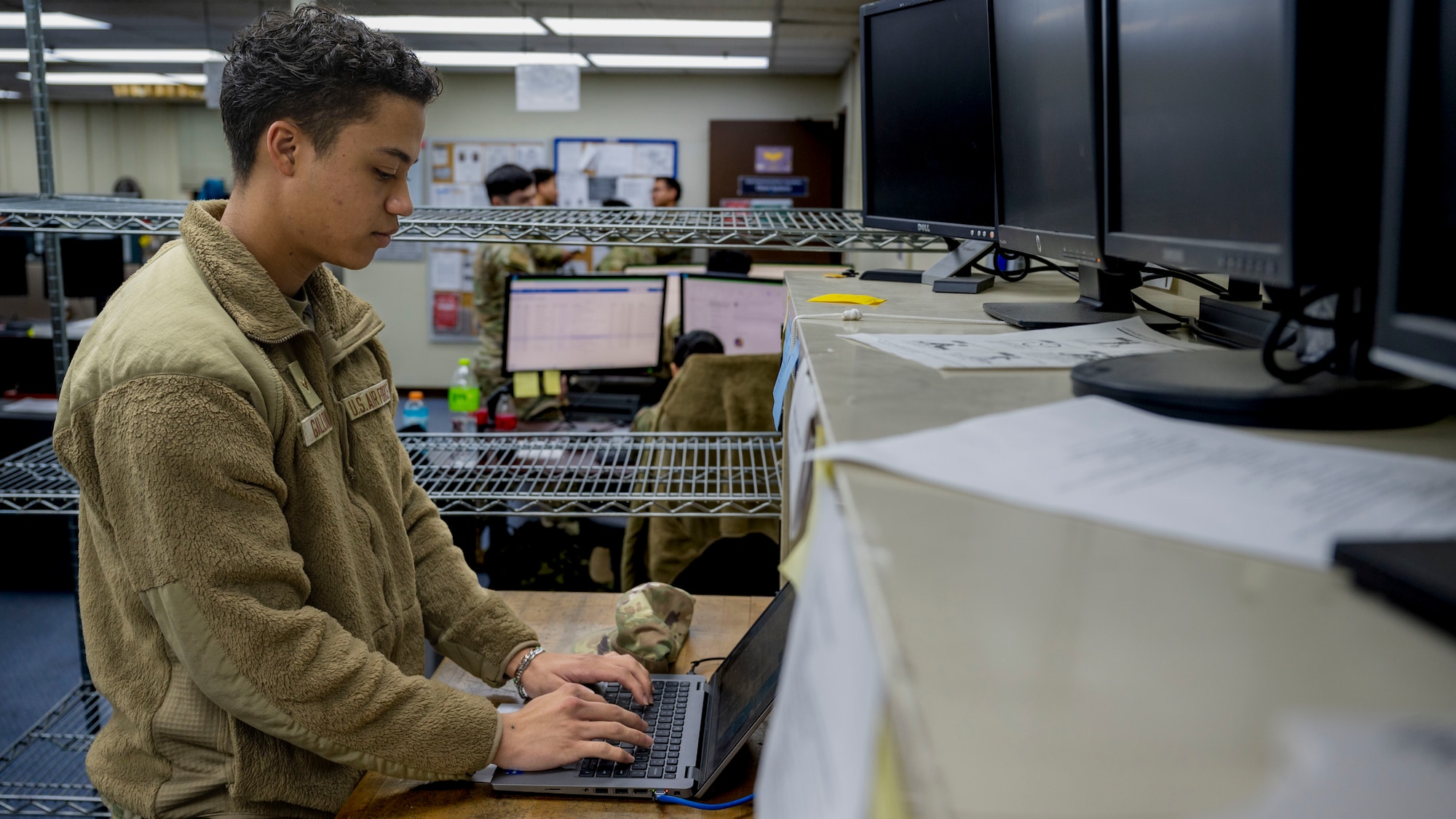 U.S. Air Force Airman 1st Class Ryan Galloway, 51st Communications Squadron network vulnerability technician, services a computer at Osan Air Base, Republic of Korea, Nov. 29, 2024. Galloway is a key executor of the 51st CS mission to enable fast-paced data operations and defend the base from malware and viruses. (U.S. Air Force photo by Senior Airman Sabrina Fuller-Judd)