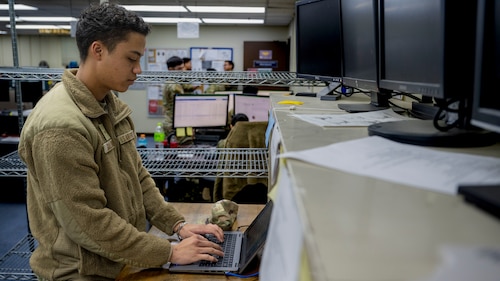 U.S. Air Force Airman 1st Class Ryan Galloway, 51st Communications Squadron network vulnerability technician, services a computer at Osan Air Base, Republic of Korea, Nov. 29, 2024. Galloway is a key executor of the 51st CS mission to enable fast-paced data operations and defend the base from malware and viruses. (U.S. Air Force photo by Senior Airman Sabrina Fuller-Judd)