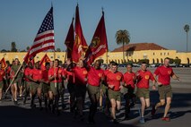 Brig. Gen. James A. Ryans II, commanding general, Marine Corps Recruit Depot San Diego and the Western Recruiting Region, leads a motivational run at MCRD San Diego, California, Nov. 21, 2024. The company motivational run is a three-mile cadence run conducted around the Depot and is the last physical training event the Marines will conduct before they graduate from MCRD San Diego. The event is also the first-time friends and families will see their newly transformed Marines. (U.S. Marine Corps photo by Lance Cpl. Jacob Hutchinson)