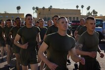 The new U.S. Marines of Alpha Company, 1st Recruit Training Battalion, participate in a motivational run at Marine Corps Recruit Depot San Diego, California, Nov. 21, 2024. The company motivational run is a three-mile cadence run conducted around the Depot and is the last physical training event the Marines will conduct before they graduate from MCRD San Diego. The event is also the first-time friends and families will see their newly transformed Marines. (U.S. Marine Corps photo by Lance Cpl. Jacob Hutchinson)