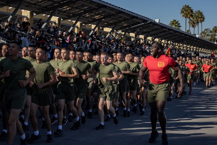 The U.S. Marines of Alpha Company, 1st Recruit Training Battalion, participate in a motivational run at Marine Corps Recruit Depot San Diego, California, Nov. 21, 2024. The company motivational run is a three-mile cadence run conducted around the Depot and is the last physical training event the Marines will conduct before they graduate from MCRD San Diego. The event is also the first-time friends and families will see their newly transformed Marines. (U.S. Marine Corps photo by Lance Cpl. Jacob Hutchinson)