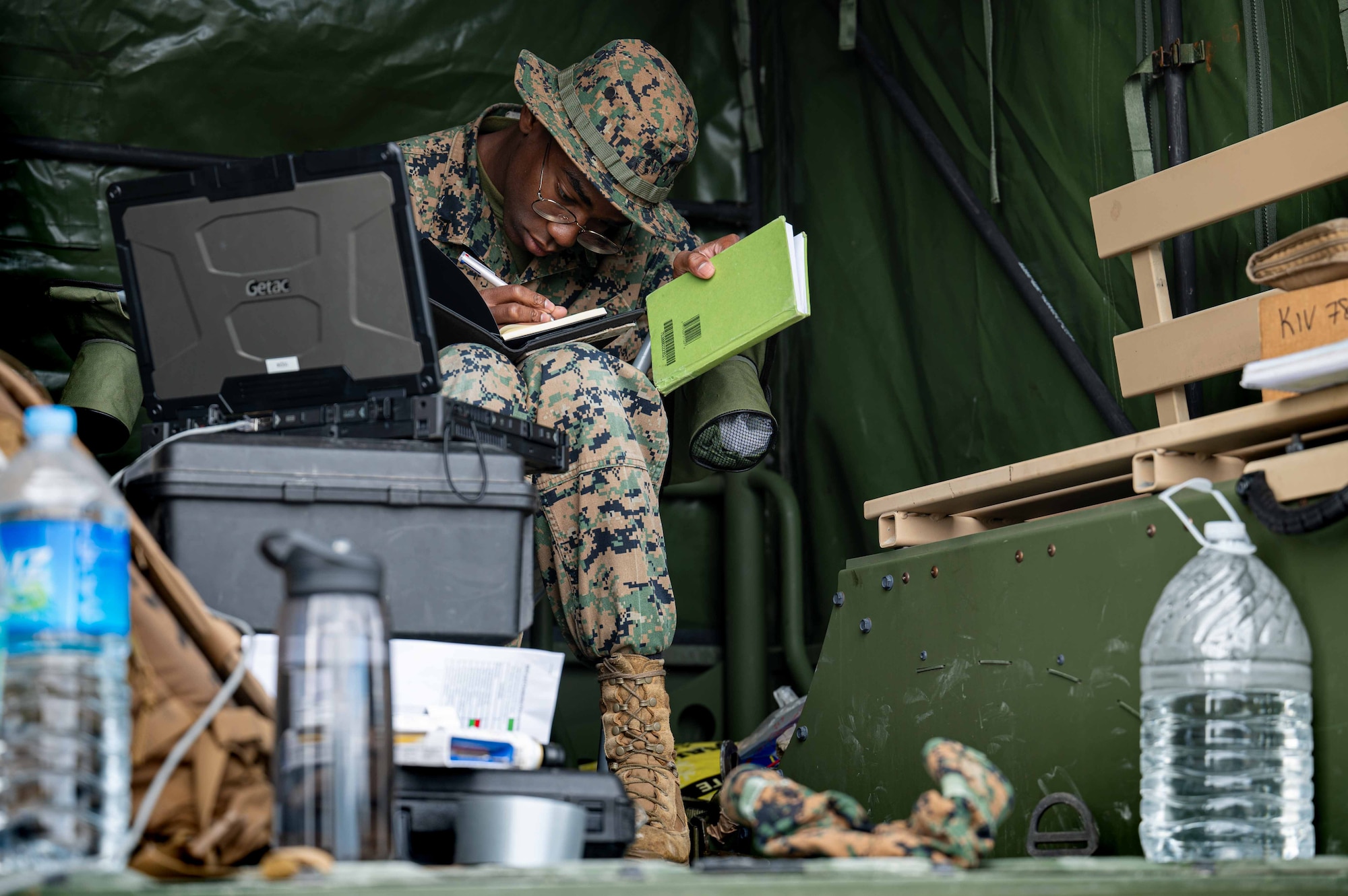 U.S. Marine Corps LCpl. Jayden Presley, 1st Marine Aircraft Wing Air Defense Company A/B Radar aviation radar technician, records data during exercise Keen Sword 25 at Misawa Air Base, Japan, Oct. 28, 2024.