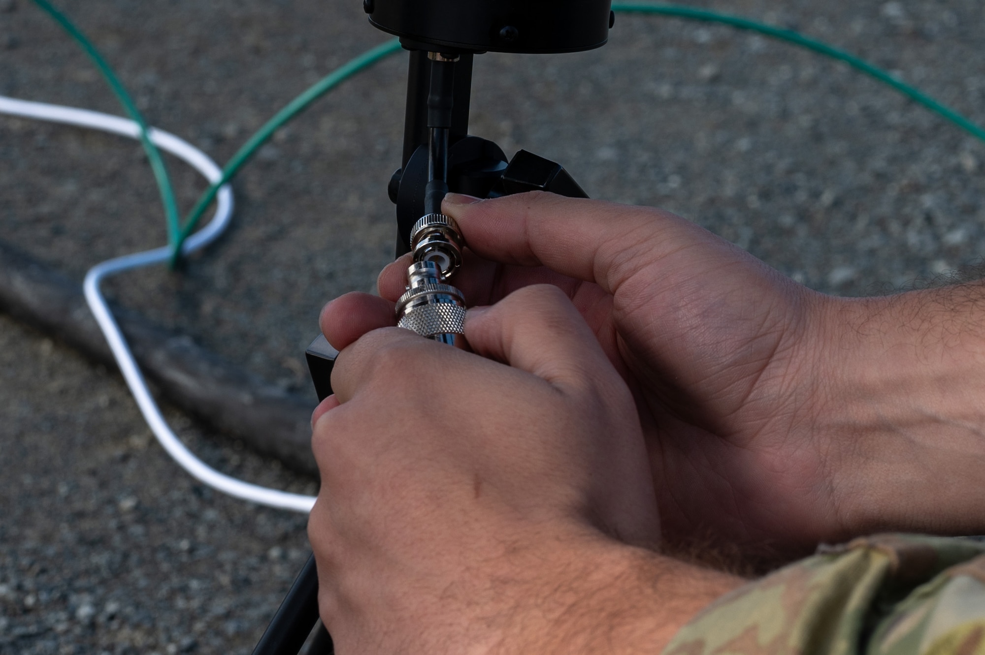 U.S. Air Force Senior Airman Jaedan Delzotti, 623rd Air Control Squadron cyber systems officer, assembles a strategic communications antenna during exercise Keen Sword 25 at Misawa Air Base, Japan, Oct. 28, 2024.