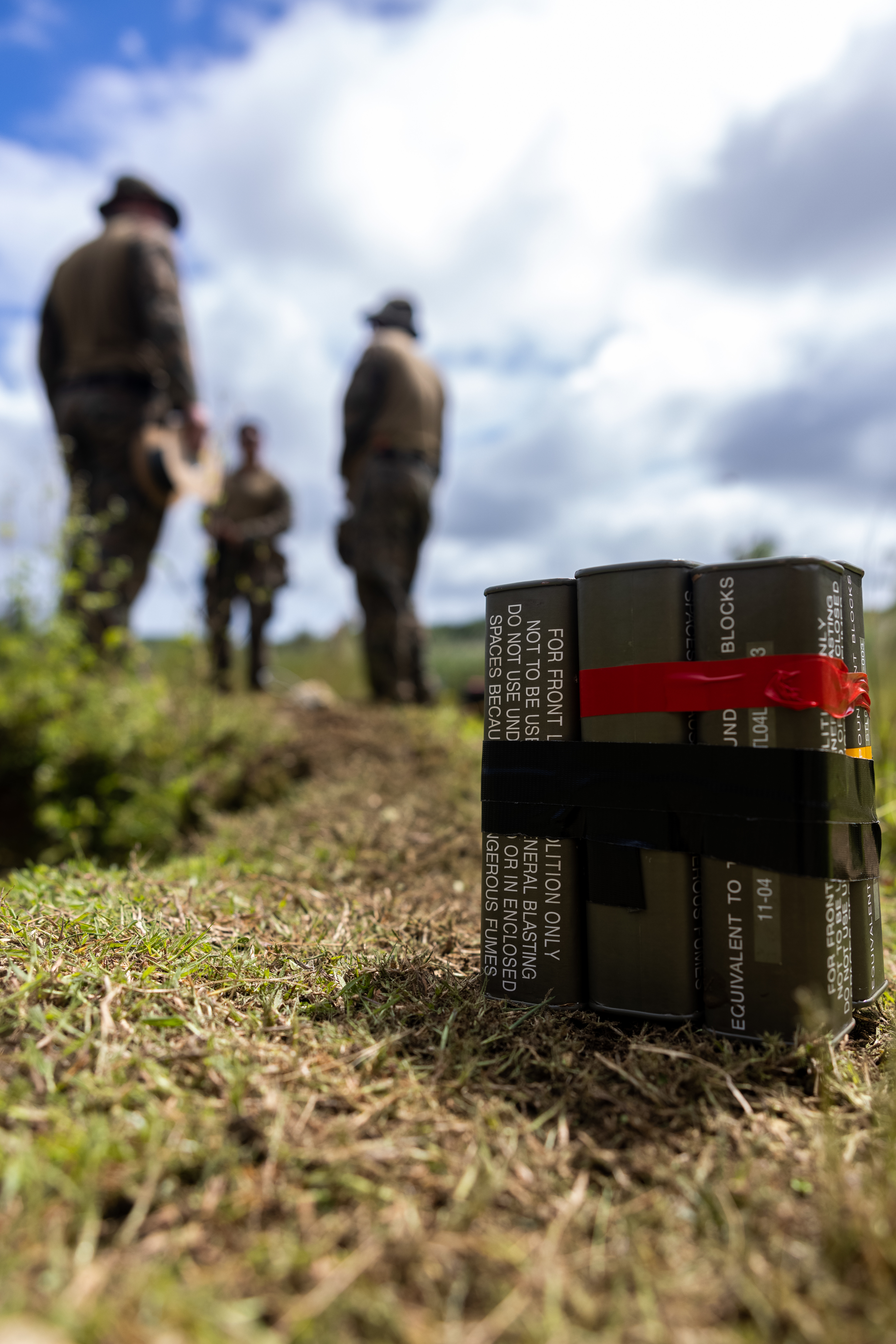 A pack of C4 sits on the range during a joint service explosive ordnance disposal range on Naval Base Guam Ordnance Annex, Guam, Oct. 31, 2024. Marine Corps Base Camp Blaz and 15th Marine Expeditionary Unit Marines participated in a joint service EOD range in order to increase tactical proficiency, as well as strengthen the interservice connection between EOD teams. (Marine Corps photo by Cpl. Ryan Little)
