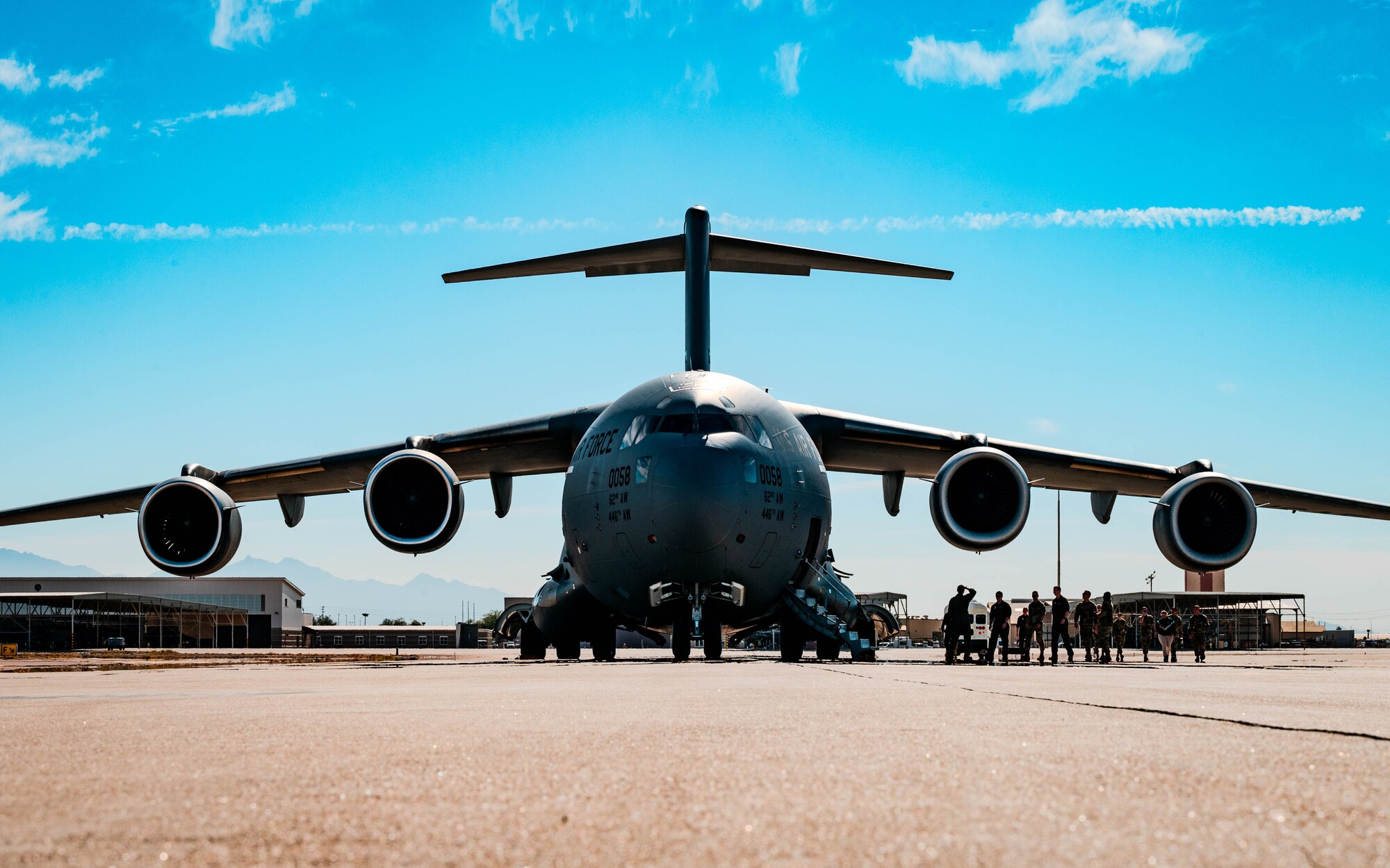Cadets from the Air Force Reserve Officer Training Corps at Embry-Riddle Aeronautical University in Prescott, Arizona, board a U.S. Air Force C-17 Globemaster III during a visit.