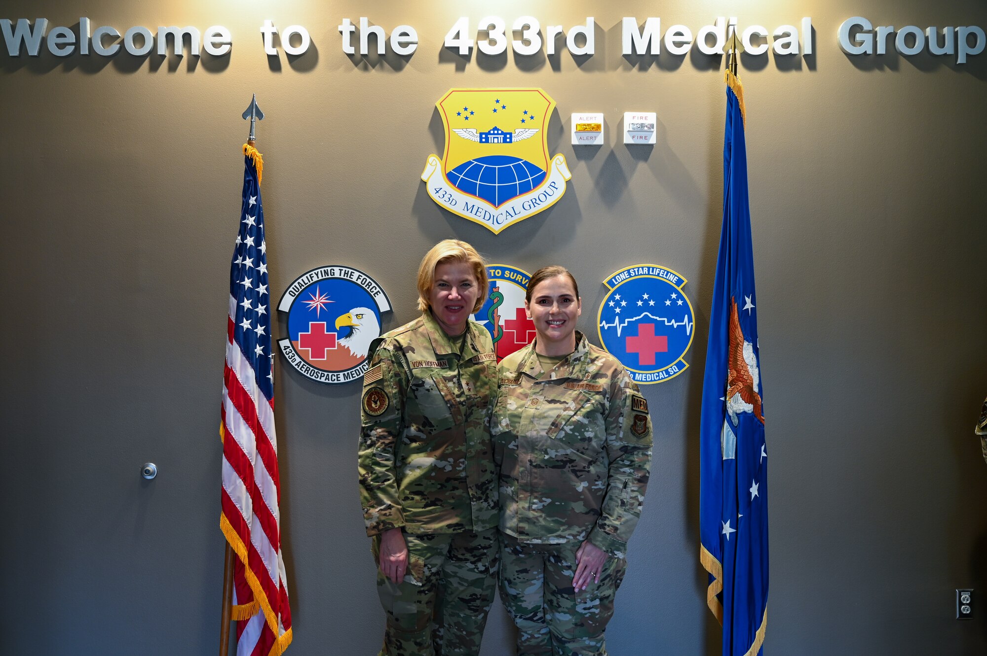 Maj. Gen. C. McCauley von Hoffman, Deputy to the Chief of Air Force Reserve, Headquarters U.S. Air Force, poses for a photo with Master Sgt. Alma Ducharme, 433rd Medical Squadron senior enlisted leader, at Joint Base San Antonio-Lackland, Texas, Nov. 19, 2024.
