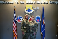 Maj. Gen. C. McCauley von Hoffman, Deputy to the Chief of Air Force Reserve, Headquarters U.S. Air Force, poses for a photo with Master Sgt. Alma Ducharme, 433rd Medical Squadron senior enlisted leader, at Joint Base San Antonio-Lackland, Texas, Nov. 19, 2024.