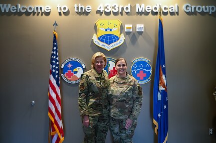 Maj. Gen. C. McCauley von Hoffman, Deputy to the Chief of Air Force Reserve, Headquarters U.S. Air Force, poses for a photo with Master Sgt. Alma Ducharme, 433rd Medical Squadron senior enlisted leader, at Joint Base San Antonio-Lackland, Texas, Nov. 19, 2024.
