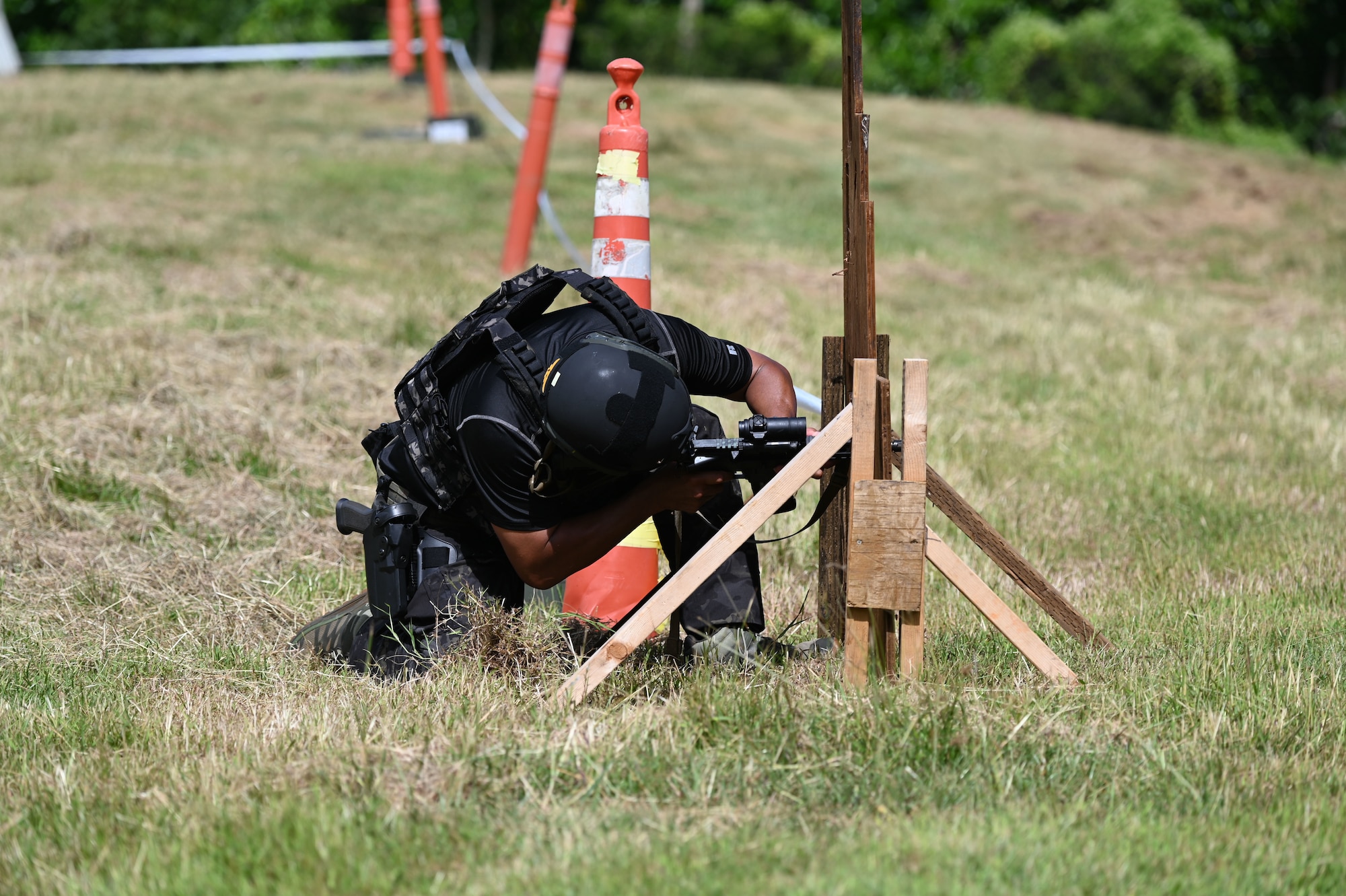 Sgt. Carl Cruz from the Guam Police Department Special Operations Division, aims his weapon downrange during a shooting competition on Andersen Air Force Base, Guam, Nov. 22, 2024. GPD was one of seven participating teams in the 2024 Battle of the Branches shooting competition. (U.S. Air Force photo by Airman 1st Class Natasha Ninete)