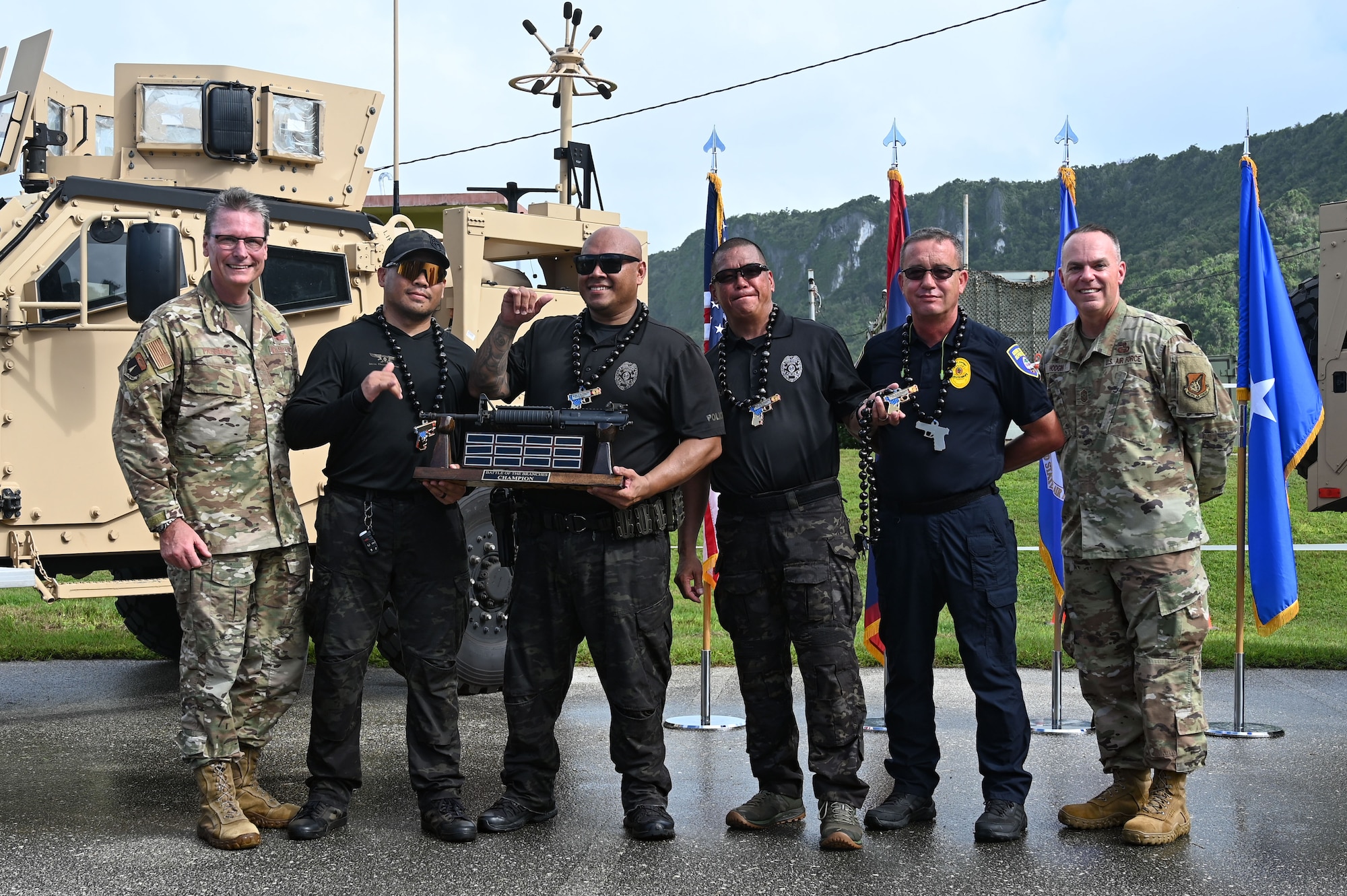 The Guam Police Department team poses as the champions of the 2024 Battle of the Branches on Andersen Air Force Base, Guam, Nov. 22, 2024. The team received the highest overall score for time and accuracy against six other participating teams. (U.S. Air Force photo by Airman 1st Class Natasha Ninete)