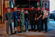 U.S. Air Force Airmen, civilians and Holley-Navarre Fire District firefighters pose for a group photo at the Holley-Navarre Fire District Station 45, in Navarre Florida, Nov. 25, 2024.