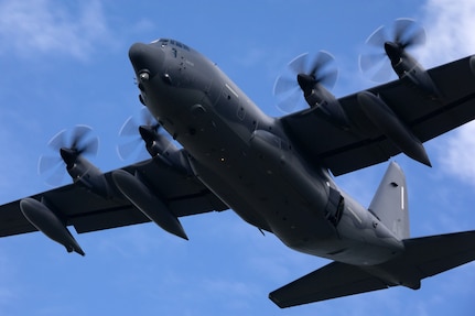 An Alaska Air National Guard HC-130J Combat King II assigned to the 211th Rescue Squadron passes over Malemute Drop Zone during airborne sustainment training at Joint Base Elmendorf-Richardson, Alaska, July 10, 2024. A 211th RQS HC-130 worked with a Coast Guard District 17 HH-60 Jayhawk to rescue a plane crash victim Nov. 21, 2024, at Lake Iliamna.