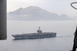 USS Harry S. Truman (CVN 75) transits the Strait of Gibraltar.