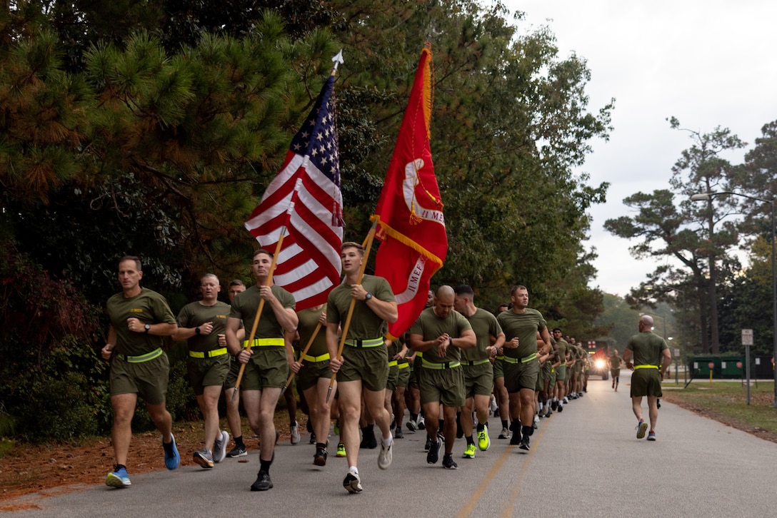 U.S Marines with II Marine Expeditionary Force Support Battalion participate in a battalion motivational run at Marine Corps Base Camp Lejeune, North Carolina, Nov. 8, 2024. The run was conducted in celebration of the 249th Marine Corps Birthday and to promote physical readiness and unit camaraderie. (U.S. Marine Corps photo by Lance Cpl. Kyle Baskin)