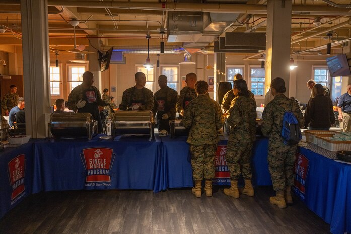 U.S. Marine Corps Brig. Gen. James A. Ryans II, the commanding general of Marine Corps Recruit Depot San Diego and the Western Recruiting Region, and leaders from Headquarters and Service Battalion, serve food to Marines at a friendsgiving event coordinated by the Depot Single Marine Program at Marine Corps Recruit Depot San Diego, California, Nov. 20, 2024. Friendsgiving is part of Spiritual Fitness Month, The Depot celebrated Spiritual Fitness Month, a program implemented to bring inner strength from higher purpose, with a friendsgiving event. MCRDSD is the first Marine Corps base to implement the Spiritual Fitness Month program. (U.S. Marine Corps photo by Cpl. Alexander O. Devereux)
