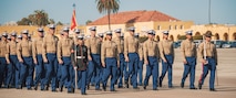 U.S. Marines with Alpha Company, 1st Recruit Training Battalion, march in formation during a graduation ceremony at Marine Corps Recruit Depot San Diego, California, Nov. 22, 2024. This ceremony marked the end of a 13-week transformation that included training in drill, marksmanship, basic combat skills, and Marine Corps customs and traditions. (U.S. Marine Corps photo by Lance Cpl. Janell B. Alvarez)