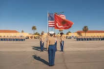U.S. Marines assigned to the Recruit Training Regiment Color Guard, Marine Corps Recruit Depot San Diego, present the colors during the Alpha Company, 1st Recruit Training Battalion, graduation ceremony at MCRD San Diego, California, Nov. 22, 2024. This ceremony marked the end of a 13-week transformation that included training in drill, marksmanship, basic combat skills, and Marine Corps customs and traditions. (U.S. Marine Corps photo by Lance Cpl. Janell B. Alvarez)