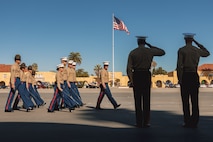 The Commanding General, Marine Corps Recruit Depot San Diego and Western Recruiting Region, U.S. Marine Corps Brig. Gen. James A. Ryans II, center and the Commanding General of 4th Marine Division, Brig. Gen. John K. Jarrard, right, return a salute to the staff and drill instructors with Alpha Company, 1st Recruit Training Battalion, during a graduation ceremony at Marine Corps Recruit Depot San Diego, California, Nov. 22, 2024. This ceremony marked the end of a 13-week transformation that included training in drill, marksmanship, basic combat skills, and Marine Corps customs and traditions. (U.S. Marine Corps photo by Lance Cpl. Janell B. Alvarez)