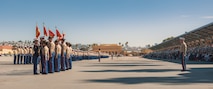 U.S. Marines with Alpha Company, 1st Recruit Training Battalion, return the guidon during a graduation ceremony at Marine Corps Recruit Depot San Diego, California, Nov. 22, 2024. This ceremony marked the end of a 13-week transformation that included training in drill, marksmanship, basic combat skills, and Marine Corps customs and traditions. (U.S. Marine Corps photo by Lance Cpl. Janell B. Alvarez)