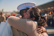 U.S. Marine Corps Pvt. Juan VillalvaCano with Alpha Company, 1st Recruit Training Battalion, greets his family members after a graduation ceremony at Marine Corps Recruit Depot San Diego, California, Nov. 22, 2024. This ceremony marked the end of a 13-week transformation that included training in drill, marksmanship, basic combat skills, and Marine Corps customs and traditions. (U.S. Marine Corps photo by Lance Cpl. Janell B. Alvarez)