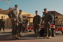 U.S. Marine Corps Maj. Gen. James B. Wellons, right, commanding general of 3rd Marine Aircraft Wing, arrives at recruiter school during a visit at Marine Corps Recruit Depot San Diego and Western Recruiting Region, California, Nov. 18, 2024. Wellons and his staff visited MCRD San Diego to observe training and learn how MCRD-SD and WRR operates. (U.S. Marine Corps photo by Lance Cpl. Janell B. Alvarez)