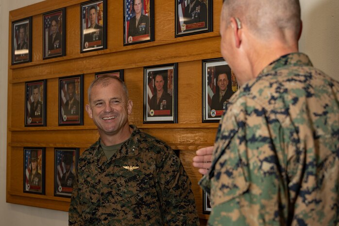 U.S. Marine Corps Maj. Gen. James B. Wellons, left, commanding general of 3rd Marine Aircraft Wing, speaks with Col. Peter M. Rummler, the commanding officer of Recruit Training Regiment, Marine Corps Recruit Depot San Diego during a visit at MCRD San Diego and Western Recruiting Region, California, Nov. 18, 2024. Wellons and his staff visited MCRD San Diego to observe training and learn how MCRD-SD and WRR operates. (U.S. Marine Corps photo by Lance Cpl. Janell B. Alvarez)