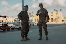 U.S Marine Corps Maj. Gen. James B. Wellons, left, commanding general of 3rd Marine Aircraft Wing, and Col. Peter M. Rummler, right, the commanding officer of Recruit Training Regiment, Marine Corps Recruit Depot San Diego converse during a visit at MCRD San Diego and Western Recruiting Region, California, Nov. 18, 2024. Wellons and his staff visited MCRD San Diego to observe training and learn how MCRD-SD and WRR operates. (U.S. Marine Corps photo by Lance Cpl. Janell B. Alvarez)