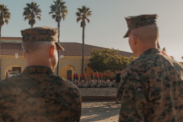 U.S Marine Corps Maj. Gen. James B. Wellons, left, commanding general of 3rd Marine Aircraft Wing, and Col. Peter M. Rummler, right, the commanding officer of Recruit Training Regiment, Marine Corps Recruit Depot San Diego observe recruits with Bravo Company, 1st Recruit Training Battalion during a visit at MCRD San Diego and Western Recruiting Region, California, Nov. 18, 2024.  Wellons and his staff visited MCRD San Diego to observe training and learn how MCRD-SD and WRR operates. (U.S. Marine Corps photo by Lance Cpl. Janell B. Alvarez)