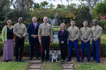 U.S. Marine Corps Maj. Gen. Robert Fulford, commanding general 1st Marine Division, center left, and Brig. Gen. James A. Ryans II, commanding general, Marine Corps Recruit Depot, Western Recruiting Region, left, pose for a photo before a breakfast at Marine Corps Recruit Depot San Diego, California, Nov. 15, 2024. When present the MCRD CG shares a meal with the parade reviewing official, primary marksmanship instructor of the highest shooting platoon, the drill instructor and recruiter of the honor graduate, and other invited guests. (U.S. Marine Corps photo by Lance Cpl. Jacob B. Hutchinson)