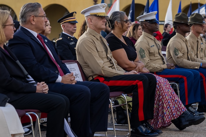 U.S. Marine Corps Maj. Gen. Robert Fulford, commanding general 1st Marine Division, observes a colors ceremony at Marine Corps Recruit Depot San Diego, California, Nov. 15, 2024. The morning colors ceremony is conducted to formally raise our nations flag and provide a brief moment to reflect on its meaning. (U.S. Marine Corps photo by Lance Cpl. Jacob B. Hutchinson)