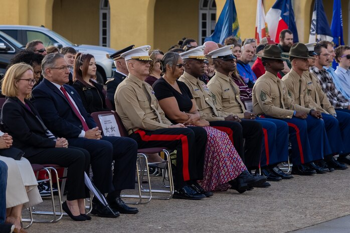 U.S. Marine Corps Maj. Gen. Robert Fulford, commanding general 1st Marine Division, observes a colors ceremony at Marine Corps Recruit Depot San Diego, California, Nov. 15, 2024. The morning colors ceremony is conducted to formally raise our nations flag and provide a brief moment to reflect on its meaning. (U.S. Marine Corps photo by Lance Cpl. Jacob B. Hutchinson)