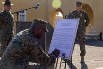 U.S. Marine Corps Brig. Gen. James A. Ryans II, commanding general of Marine Corps Recruit Depot San Diego and the Western Recruiting Region, signs a proclamation of spiritual fitness month, during the kick-off to spiritual fitness month at Marine Corps Recruit Depot San Diego, California, Nov. 4, 2024. The Depot celebrated Spiritual Fitness Month, a program implemented to bring inner strength from higher purpose, with a spiritual fitness proclamation signing. MCRDSD is the first Marine Corps base to implement the Spiritual Fitness Month program. (U.S. Marine Corps photo by Cpl. Alexander O. Devereux)