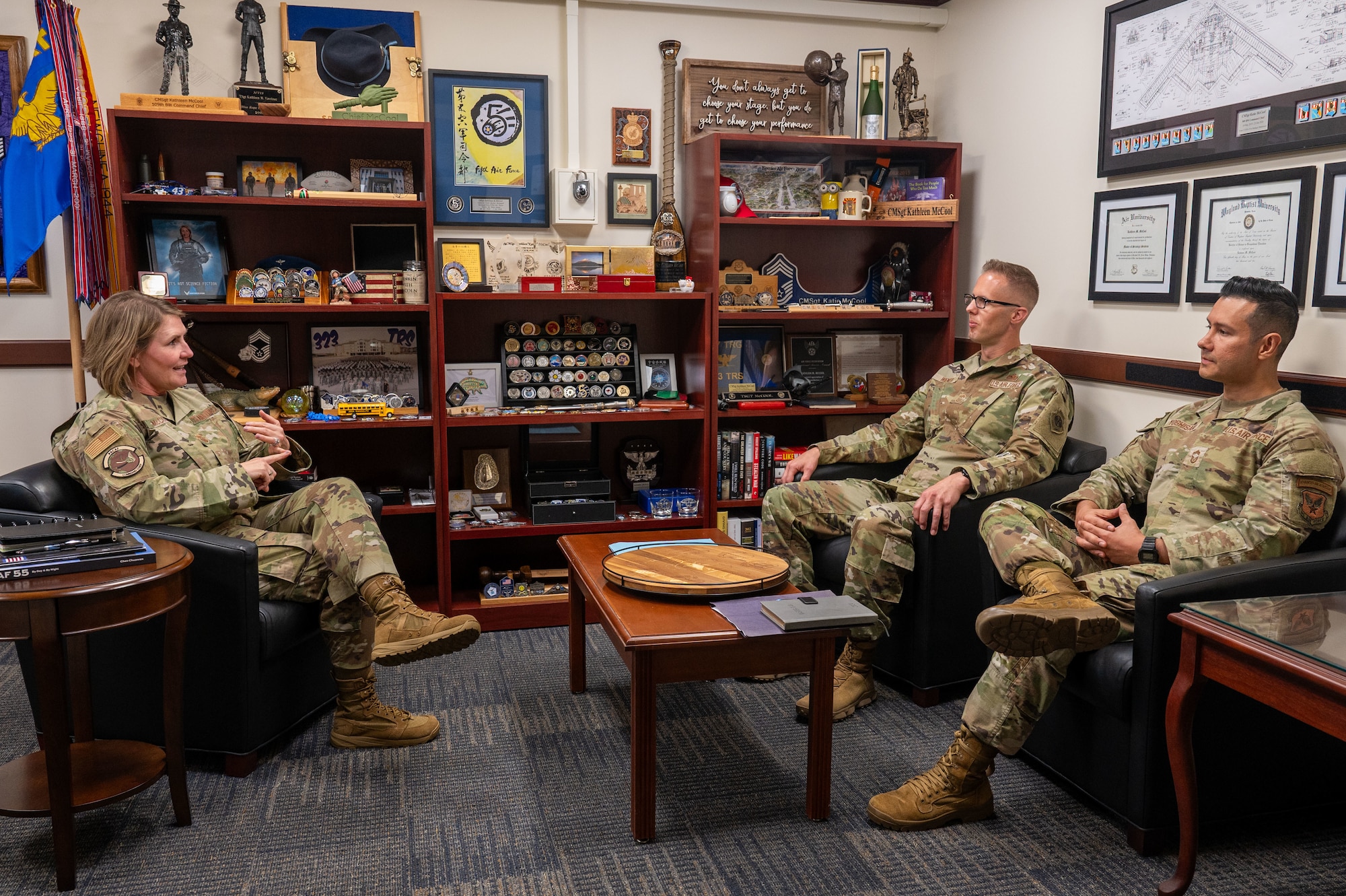Chief Master Sgt. Katie McCool, Pacific Air Forces command chief, discusses the Inter-Pacific Air Forces Academy with Chief Master Sgt. Joshua Wiener, Ninth Air Force (Air Forces Central) command chief, and Chief Master Sgt. Diego Yoshisaki, Secretary of the Air Force International Affairs senior enlisted advisor, at PACAF Headquarters, Joint Base Pearl Harbor-Hickam, Hawaii, Nov. 25, 2024. The discussion highlighted IPAFA’s success in fostering multinational collaboration and leadership development among Indo-Pacific air forces. Wiener expressed interest in replicating the program within AFCENT to strengthen partnerships and enhance seamless cooperation in multinational missions. The program focuses on leadership, cross-cultural competency, resilience, and mission command, making it a critical tool for advancing joint operations and interoperability. (U.S. Air Force photo by Senior Airman Melody Bordeaux)