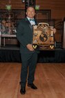 Retired U.S. Marine Corps Master Sgt. Frank M. Puebla, the guest of honor, poses for a photo during a birthday ball ceremony in San Diego, California, Nov. 8, 2024. A celebration of the 249th Marine Corps birthday was held to reflect on the traditions, history and legacy of the Marine Corps. (U.S. Marine Corps photo by Lance Cpl. Janell B. Alvarez)