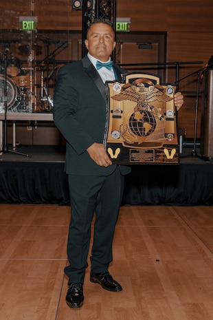 Retired U.S. Marine Corps Master Sgt. Frank M. Puebla, the guest of honor, poses for a photo during a birthday ball ceremony in San Diego, California, Nov. 8, 2024. A celebration of the 249th Marine Corps birthday was held to reflect on the traditions, history and legacy of the Marine Corps. (U.S. Marine Corps photo by Lance Cpl. Janell B. Alvarez)