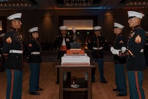 U.S. Marine Corps Col. David Arenas, oldest Marine present and Pfc. Isaiah Escobar, youngest Marine present with Marine Corps Recruit Depot San Diego, stand during a birthday ball ceremony in San Diego, California, Nov. 8, 2024. A celebration of the 249th Marine Corps birthday was held to reflect on the traditions, history and legacy of the Marine Corps. (U.S. Marine Corps photo by Lance Cpl. Janell B. Alvarez)
