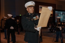 U.S. Marine Corps 1st Lt. Steven Martinez, adjutant with Recruit Training Regiment, Marine Corps Recruit Depot San Diego, reads Maj. Gen. John A. Lejeune’s birthday message during a birthday ball ceremony in San Diego, California, Nov. 8, 2024. A celebration of the 249th Marine Corps birthday was held to reflect on the traditions, history and legacy of the Marine Corps. (U.S. Marine Corps photo by Lance Cpl. Janell B. Alvarez)