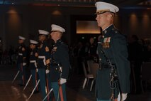 U.S. Marine Corps Maj. Matthew Harris, right, the executive officer of 2nd Recruit Training Battalion, Recruit Training Regiment, participates in a sword detail during a birthday ball ceremony in San Diego, California, Nov. 8, 2024. A celebration of the 249th Marine Corps birthday was held to reflect on the traditions, history and legacy of the Marine Corps. (U.S. Marine Corps photo by Lance Cpl. Janell B. Alvarez)