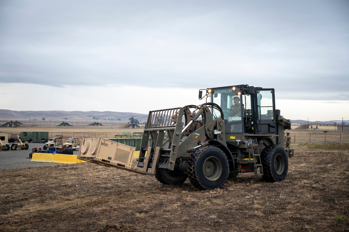 An Airman with the 821st Contingency Response operates a forklift during a part task trainer at the Global Readiness Deployment Center on Travis Air Force Base, California, Nov. 21, 2024.