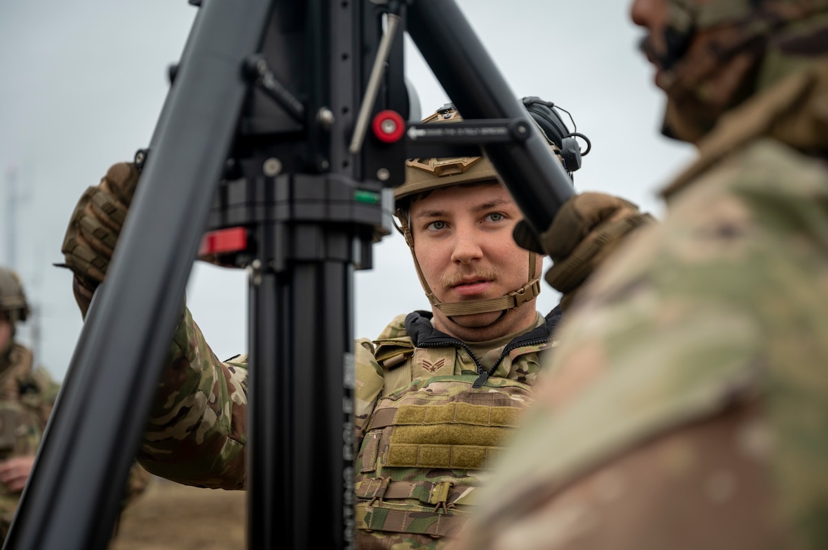 Airmen with the 821st Contingency Response set up a communication antenna during a part task trainer at the Global Readiness Deployment Center on Travis Air Force Base, California, Nov. 21, 2024.