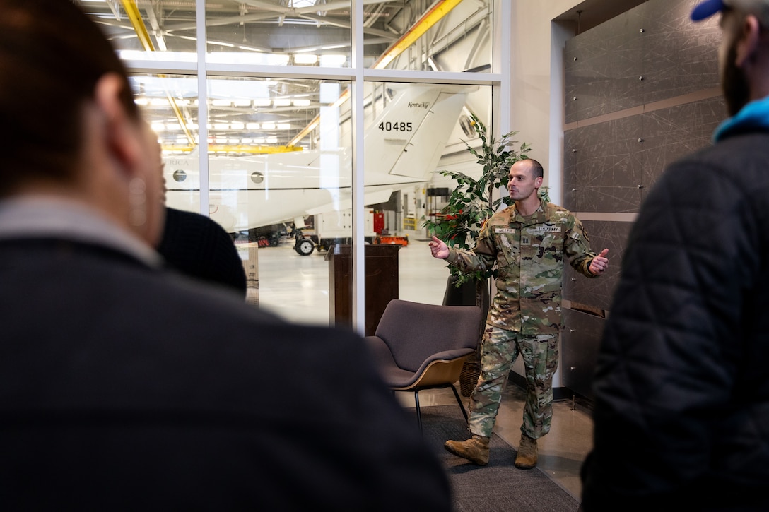 U.S. Army Capt. Joseph Miller speaks to local leaders from Leadership Frankfort  on Boone National Guard Center in Frankfort, Kentucky on Nov. 21, 2024.  The Kentucky National Guard invited the group Leadership Frankfort to engage with local commerce leaders on the dual mission of the National Guard. (U.S. Army National Guard photos by Andy Dickson)