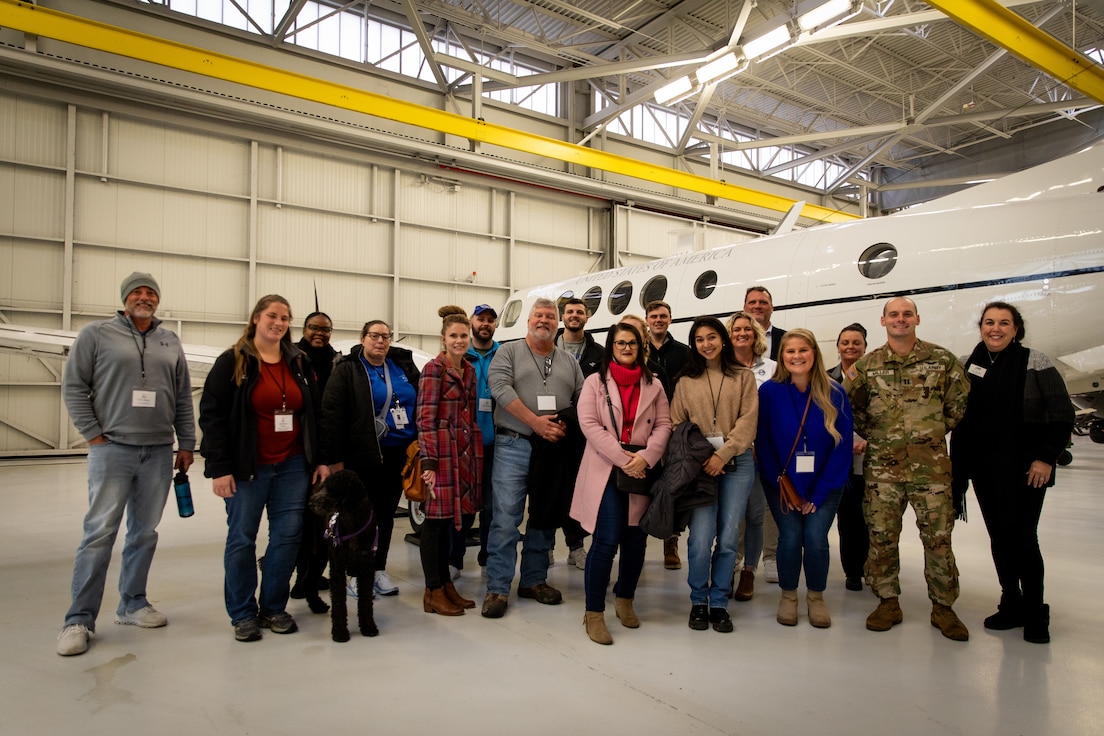 The Kentucky National Guard directorate of military support (DOMS) and members of Leadership Frankfort pose for a group photo on Boone National Guard Center in Frankfort, Kentucky on Nov. 21, 2024.  The Kentucky National Guard invited the group Leadership Frankfort to engage with local commerce leaders on the dual mission of the National Guard. (U.S. Army National Guard photos by Andy Dickson)