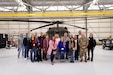 The Kentucky National Guard directorate of military support (DOMS) and members of Leadership Frankfort pose for a group photo on Boone National Guard Center in Frankfort, Kentucky on Nov. 21, 2024.  The Kentucky National Guard invited the group Leadership Frankfort to engage with local commerce leaders on the dual mission of the National Guard. (U.S. Army National Guard photos by Andy Dickson)