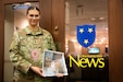 U.S. Army Spc. Brianna Hunter poses in front of the Murray State University newsroom wearing a hand-beaded necklace from the Mississippi Band of Choctaws at Murray State University in Murray, Kentucky on Nov. 25, 2024. Hunter is one-eighth Choctaw, serves in the Kentucky National Guard and is the editor-in-chief for the Murray State University newspaper and has written an article for the newspaper on her Native American Indian heritage. (U.S. Army National Guard photo by Andy Dickson)