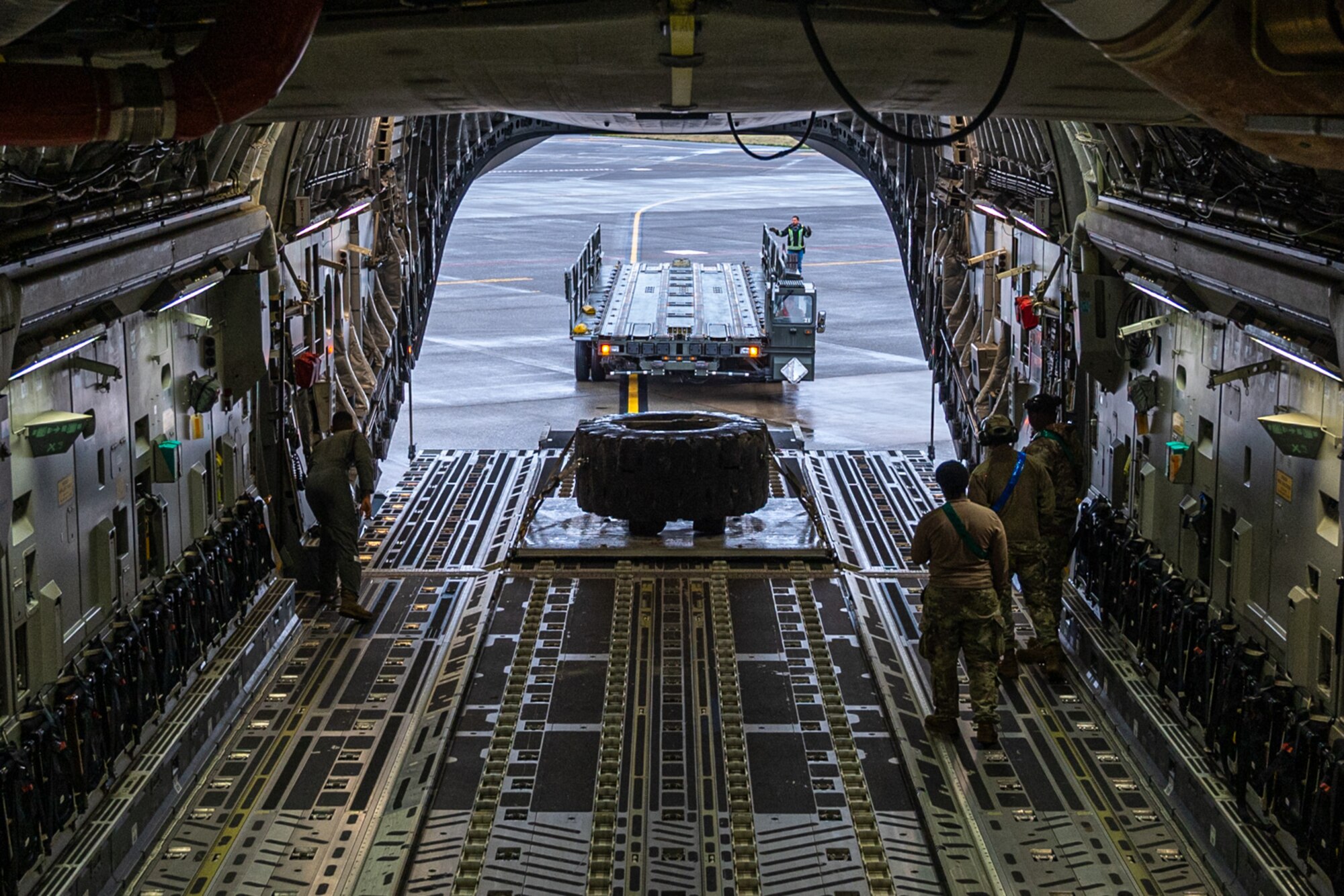 U.S. Air Force Airmen with the 62d Airlift Wing prepare for a training sortie at Joint Base Lewis-McChord, Washington, Nov. 26. 2024. This training sortie included low-level flying and combat maneuvering for pilot requalification and combat offload practice for the loadmaster onboard. Training sorties like this are critical to ensuring all Airmen are mission ready while preparing the Wing to win.