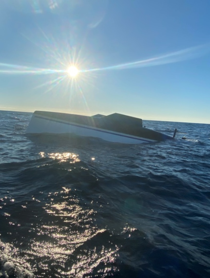 A capsized sailing vessel drifts 65 miles East of Brunswick, Georgia, Nov. 24, 2024 The Coast Guard searched for 2 missing mariners with negative results, at which time the search was suspended. (Courtsey Photo by U.S. Coast Guard).