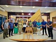 Representatives from U.S. Coast Guard Forces Micronesia/Sector Guam and U.S. Coast Guard District 14 and Republic of the Marshall Islands (RMI) partners stand for a photo in Majuro, RMI, on Nov. 8, 2024.