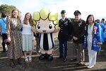 U.S. Army Garrion Japan Commander Col. Marcus Hunter, third from right, and Command Sgt. Maj. David Rio, second from right, pose for a photo with Zama Mayor Mito Sato, right, and Zamarin, the city’s mascot, while attending the city’s Hometown Festival Nov. 17.