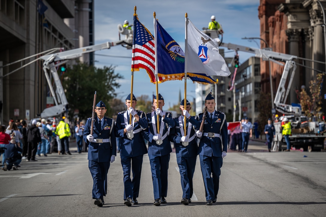 The Civil Air Patrol’s Louisville Cadet Squadron 039 Color Guard marches down Jefferson Street during the annual Veterans Day Parade in downtown Louisville, Ky., Nov. 9, 2024. The event featured appearances by more than 50 organizations, including the Kentucky Air National Guard and its Mini C-130 Hercules scale replica.